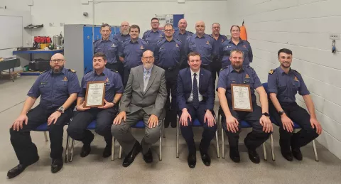 Blythe Coastguard Rescue Team with, front row: Coastal Operations Area Commander Martin Lowe; Scott Reed; Jon Wright and Peter Liley from Tynemouth Medal Trust; Sean Robinson and Ryan Douglas